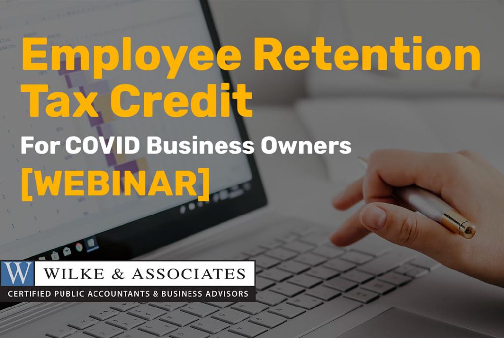 Employee Retention Tax Credit webinar banner with woman typing on laptop in background