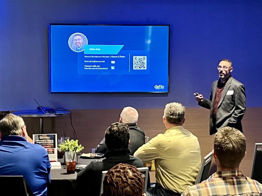 Brian Dotty of Datto presents to Pitt IEE members sharing insights on business cyber security framework at TopGolf Pittsburgh.