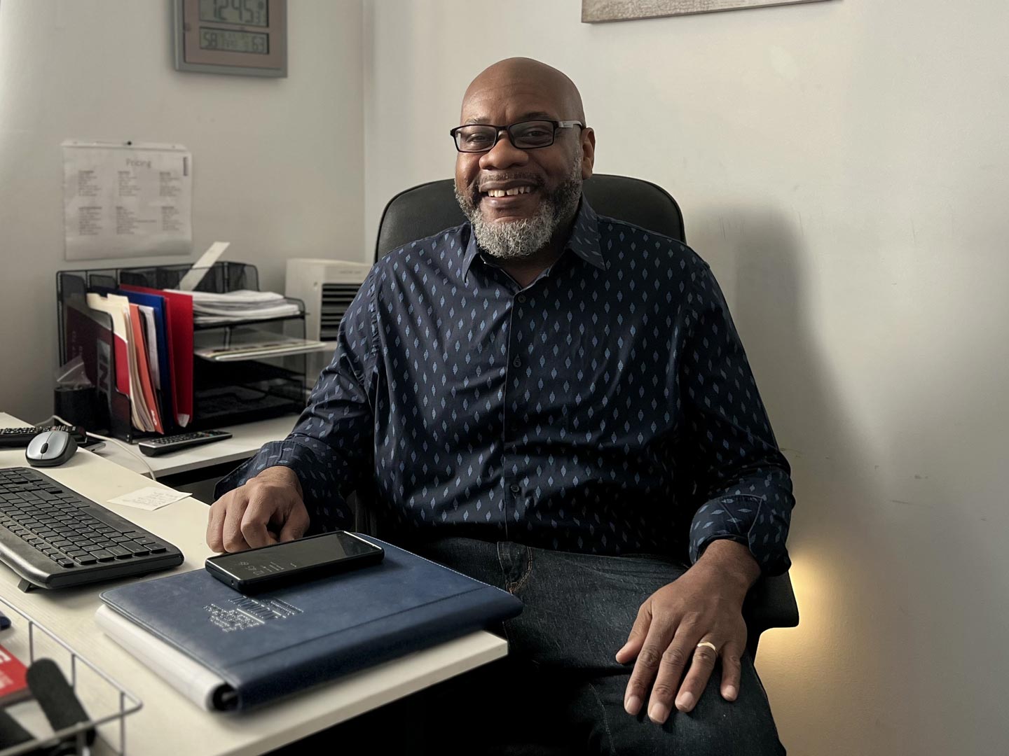 Curtis Brown sitting in his office